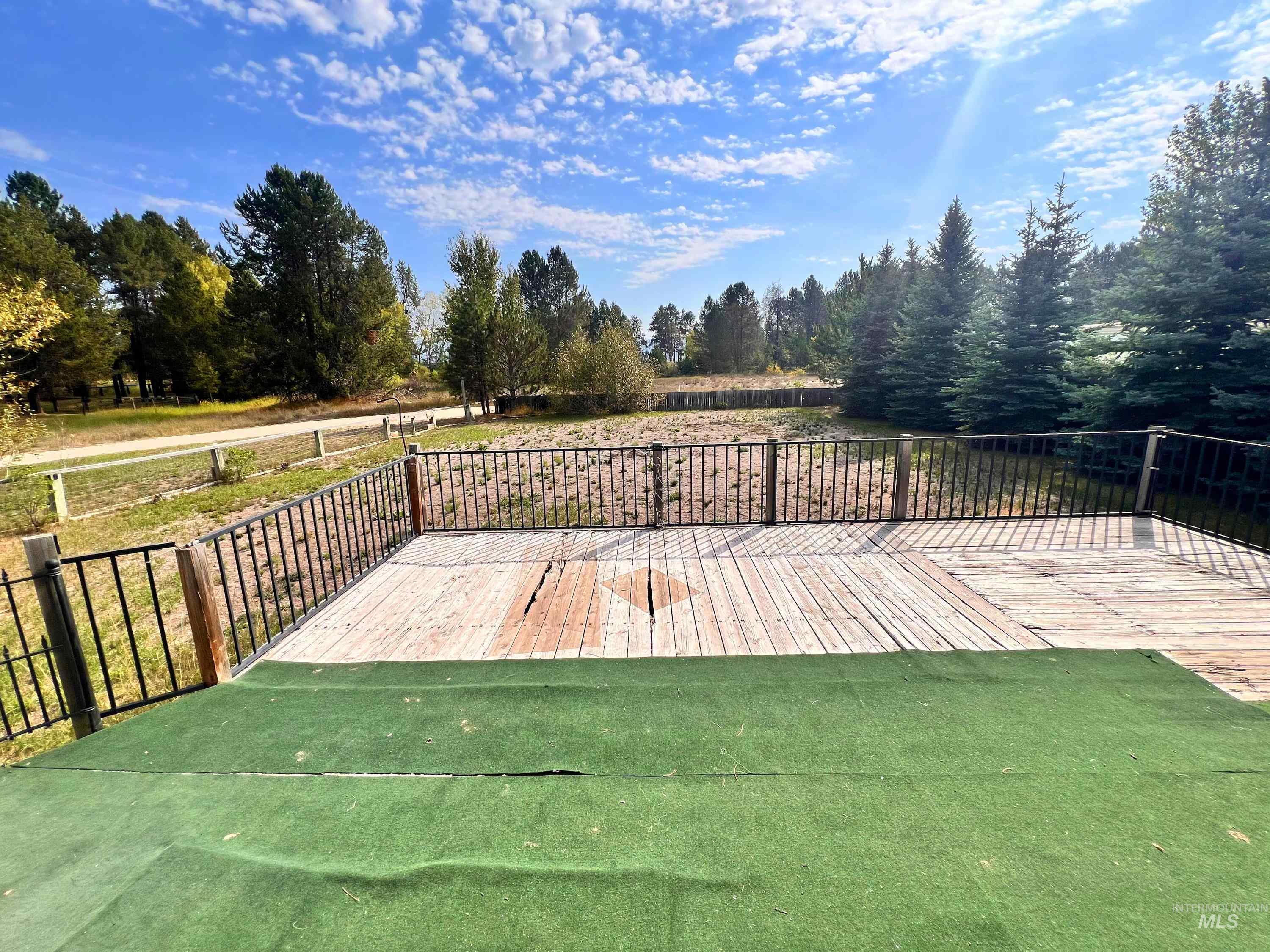 955 South Main Street, Unit 30 Cascade, ID 83611 - Photo 4 of 19 Deck featuring a lawn