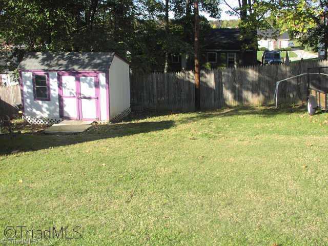 512 Apple Ridge Road Greensboro, NC 27406 - Photo 2 of 9 Other. Fenced Backyard with storage building