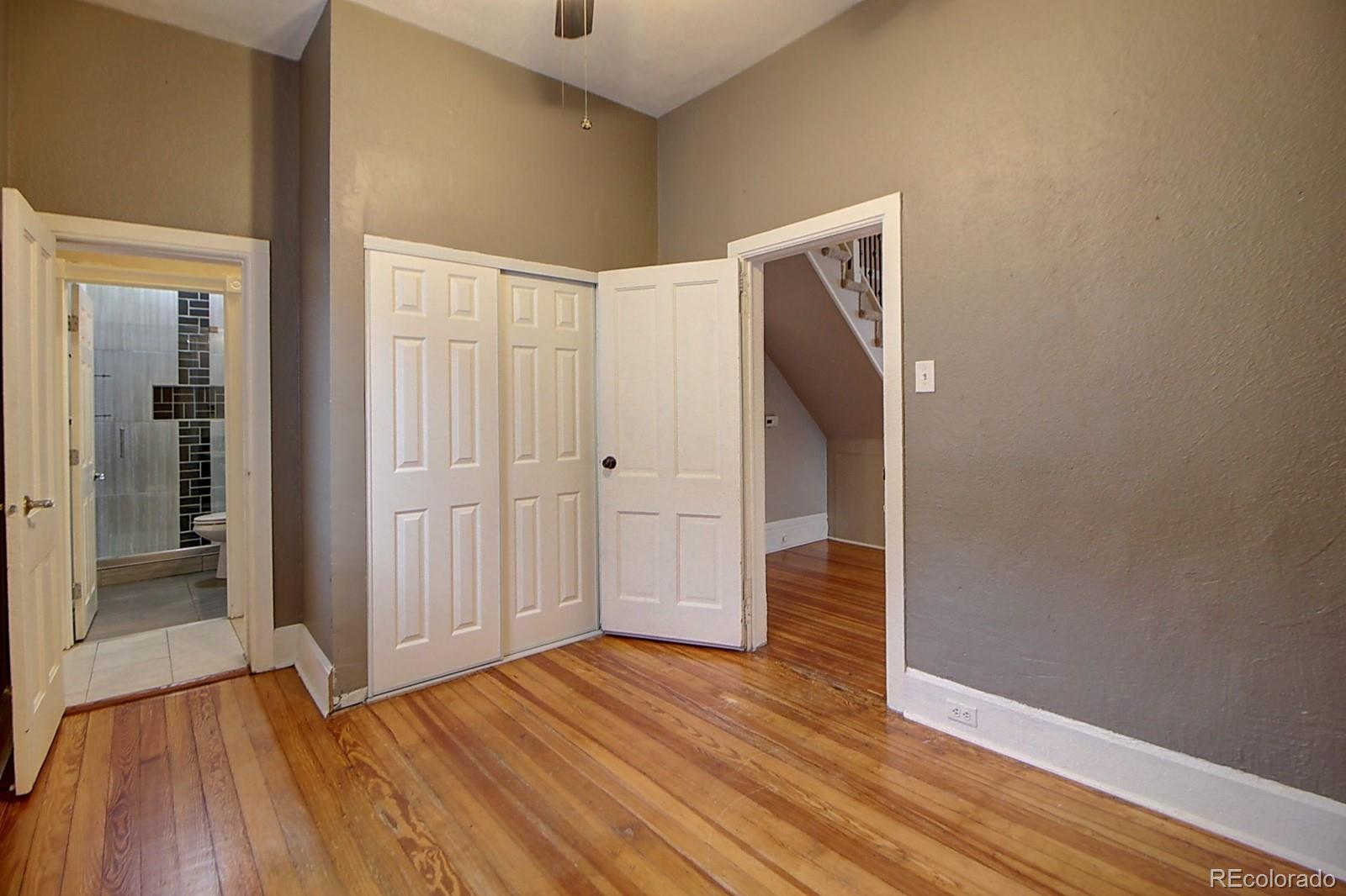 328 Inca Street Denver, CO 80223 - Photo 13 of 35 wooden floor in an empty room