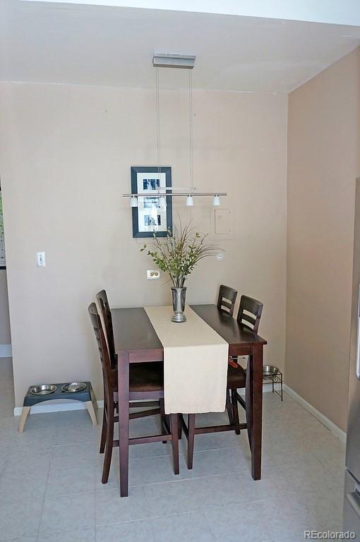 328 Inca Street Denver, CO 80223 - Photo 18 of 35 a view of a workspace with furniture