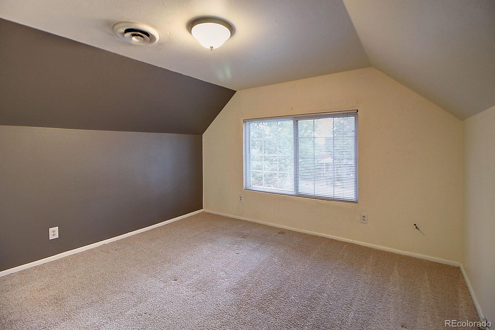 328 Inca Street Denver, CO 80223 - Photo 26 of 35 an empty room with a window