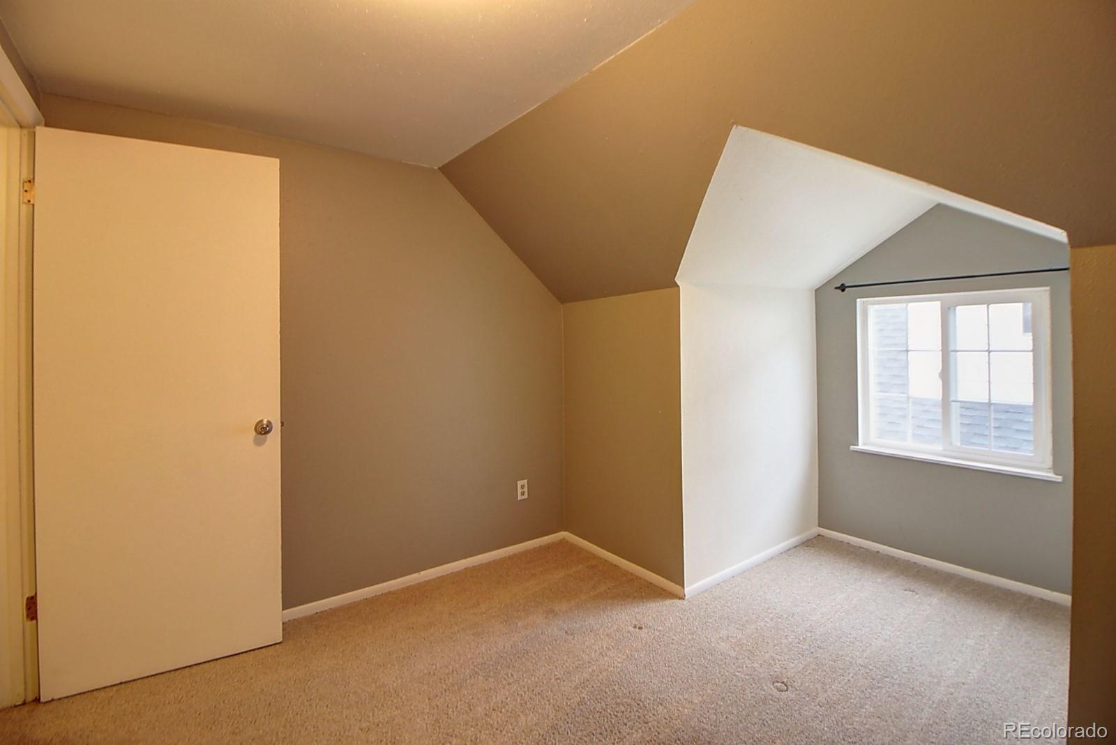 328 Inca Street Denver, CO 80223 - Photo 30 of 35 a view of an empty room with a window