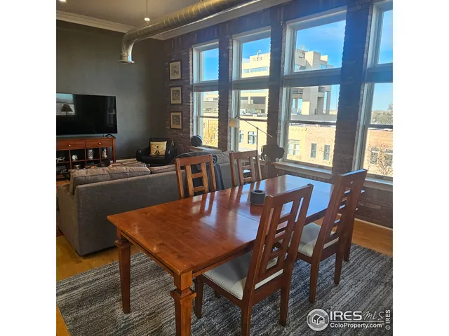 a bedroom with a bed and a view of bathroom