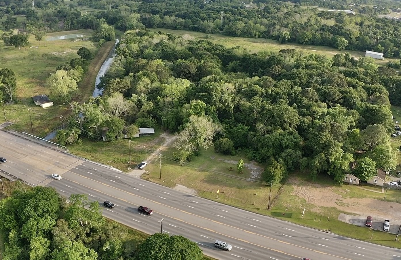 0 West Tx -6 Alvin, TX 77511 - Photo 7 of 15 a view of a lake with a yard