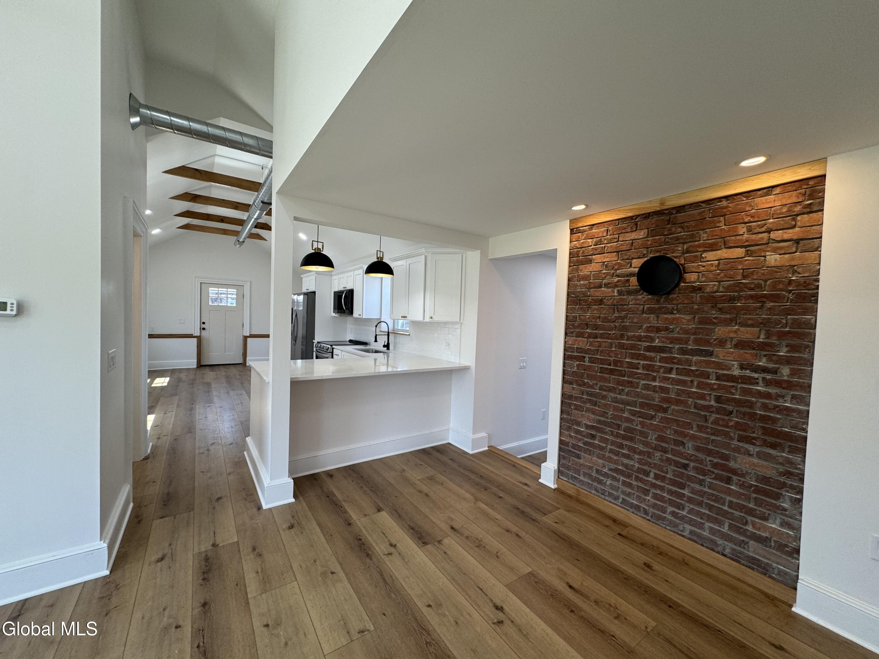 675 Mac Elroy Road Clifton Park, NY 12019 - Photo 26 of 54 Exposed Brick Wall!