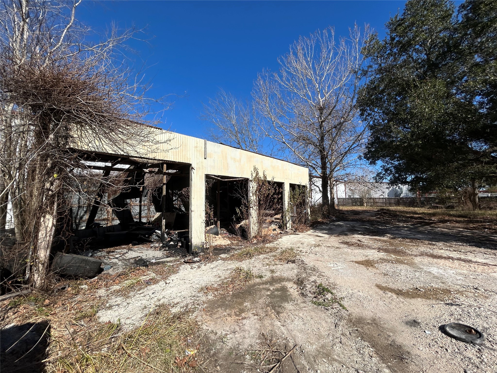 8879 Bailey Road Pearland, TX 77578 - Photo 15 of 17 a view of a house with a yard covered with snow in a yard