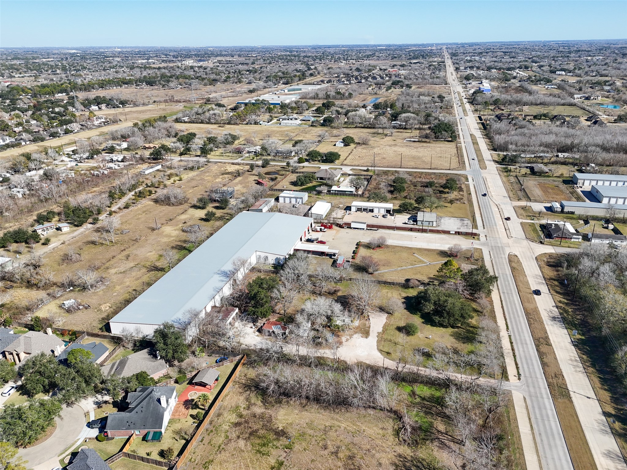 8879 Bailey Road Pearland, TX 77578 - Photo 2 of 17 an aerial view of residential houses with outdoor space