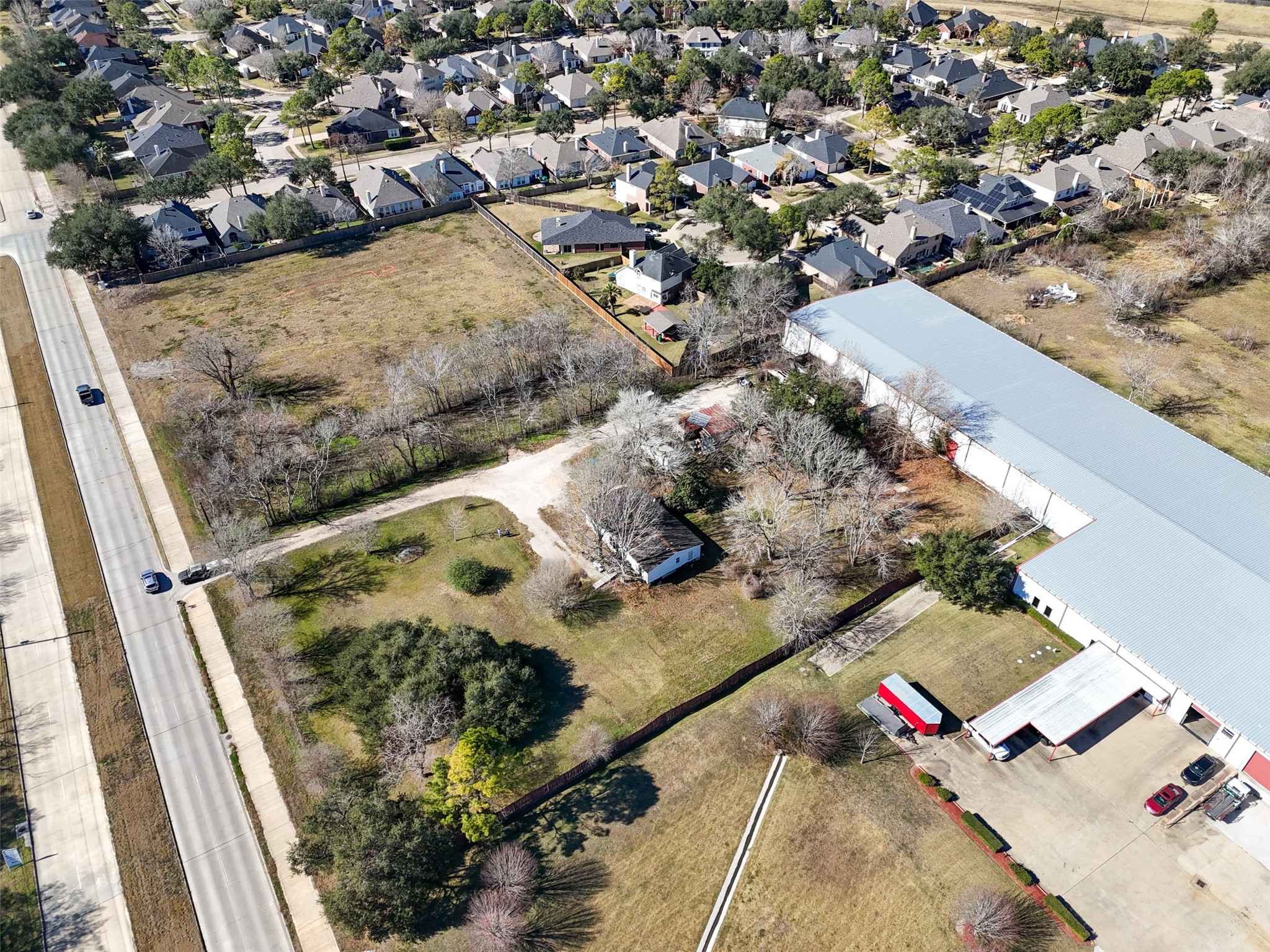 8879 Bailey Road Pearland, TX 77578 - Photo 8 of 17 an aerial view of residential houses with outdoor space