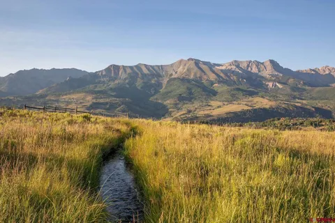 a view of lake and mountain