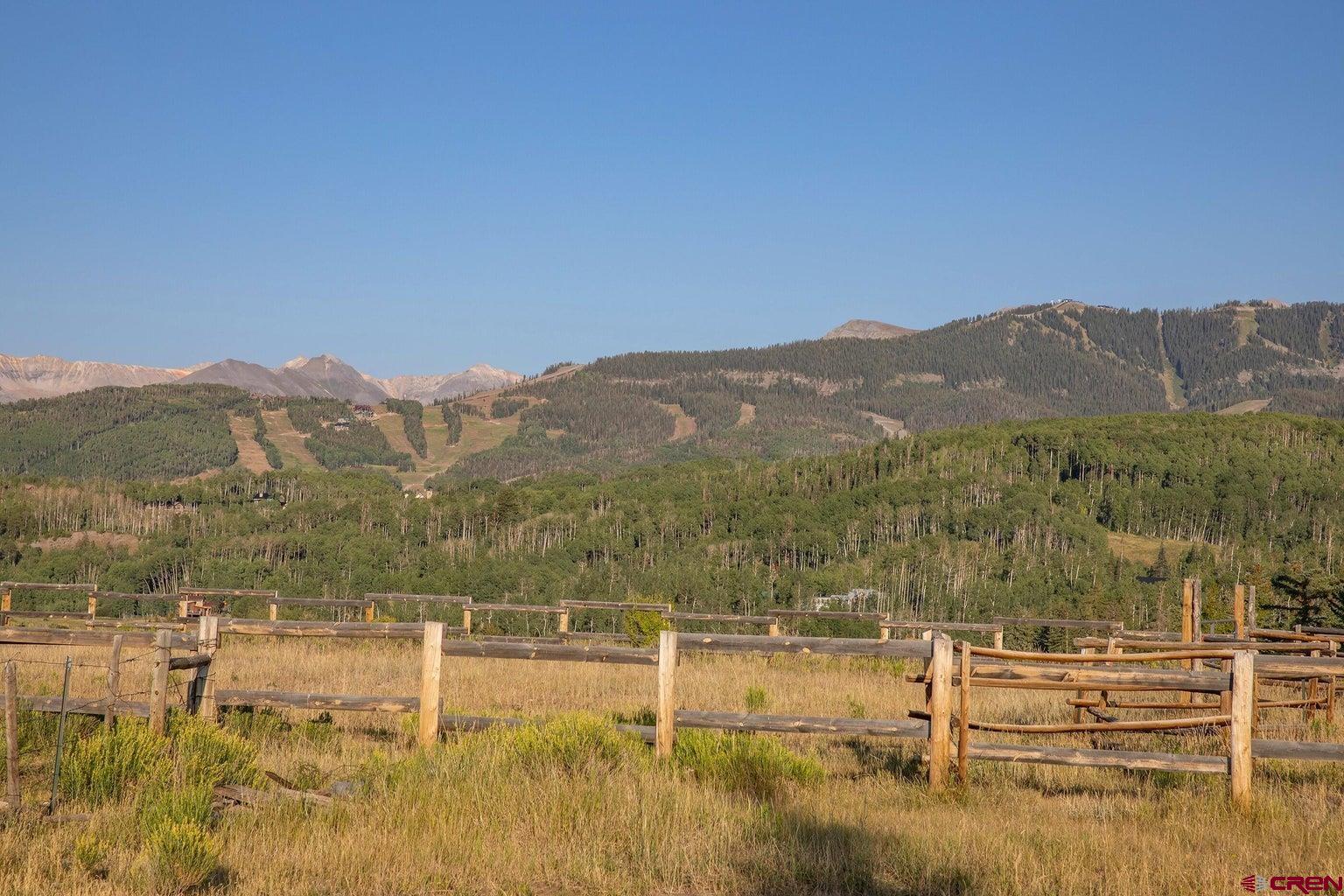 750 B Wagner Way Telluride, CO 81435 - Photo 14 of 20 a view of a town with mountains in the background