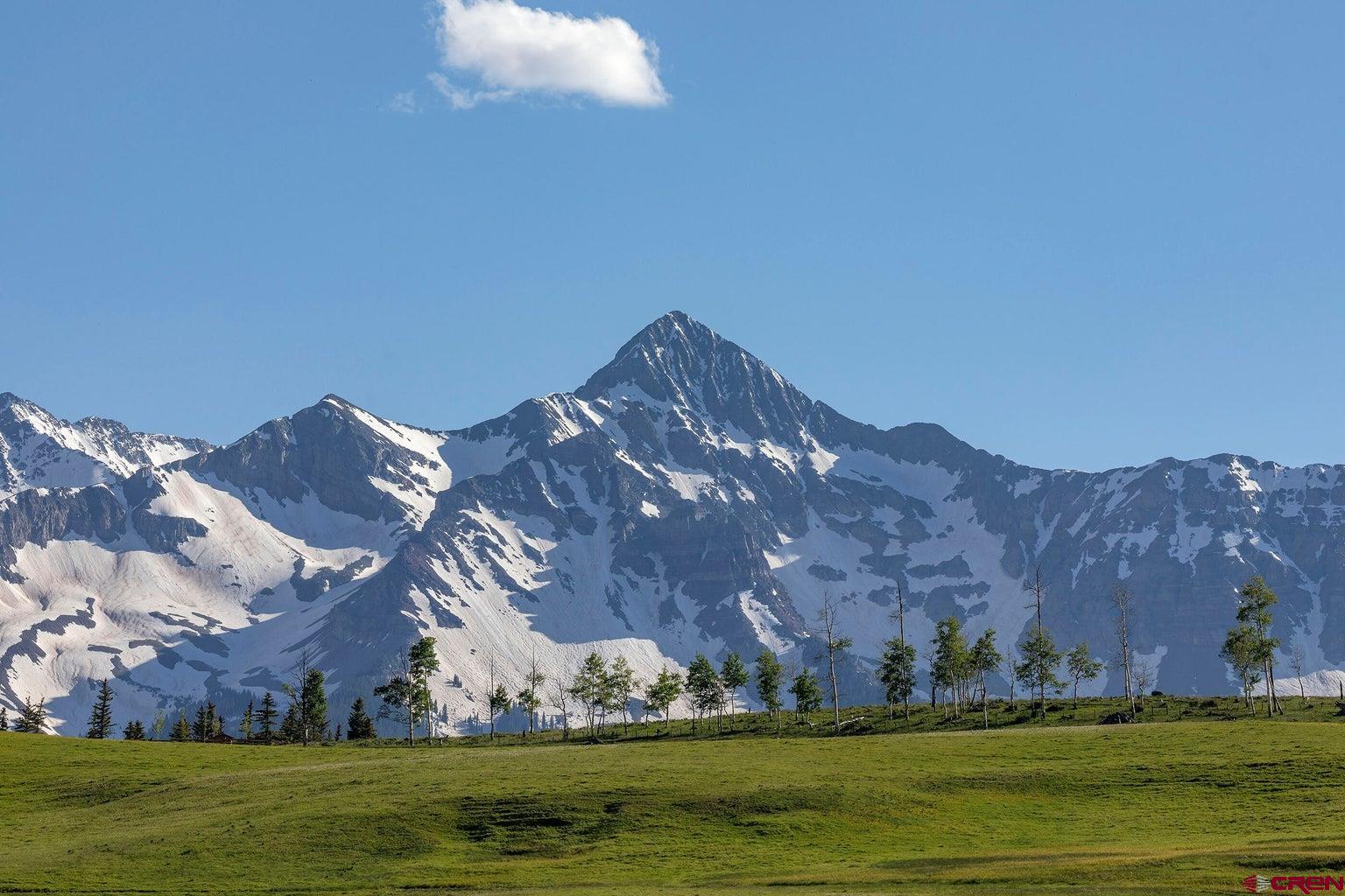 750 B Wagner Way Telluride, CO 81435 - Photo 10 of 20 a view of an ocean with a mountain in the background