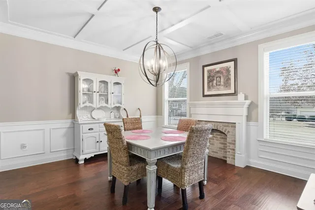 a view of kitchen with stainless steel appliances granite countertop cabinets and sink