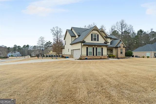 an aerial view of house with outdoor space