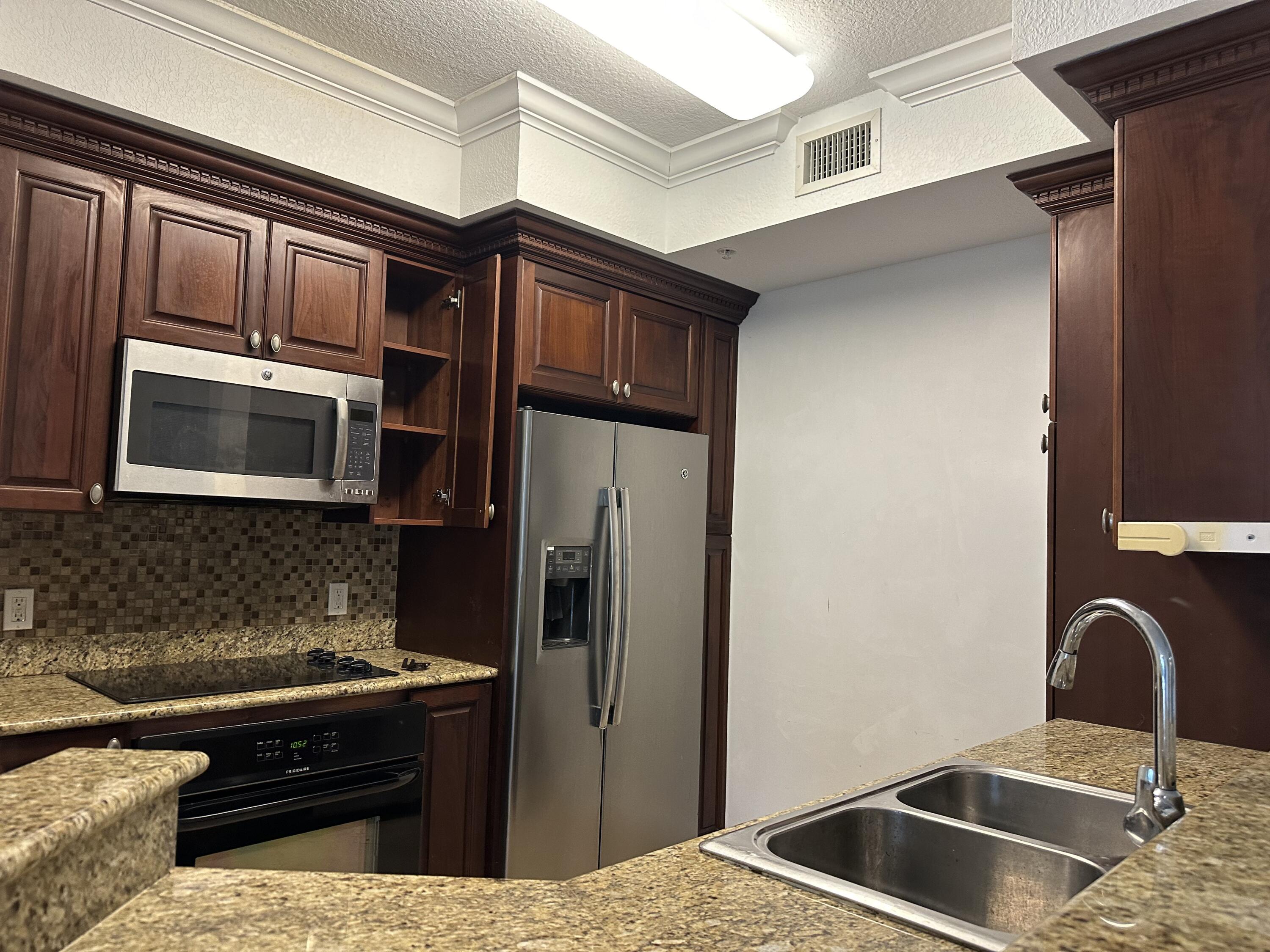 1660 Renaissance Commons Boulevard, Unit 2218 Boynton Beach, FL 33426 - Photo 11 of 47 6 kitchen