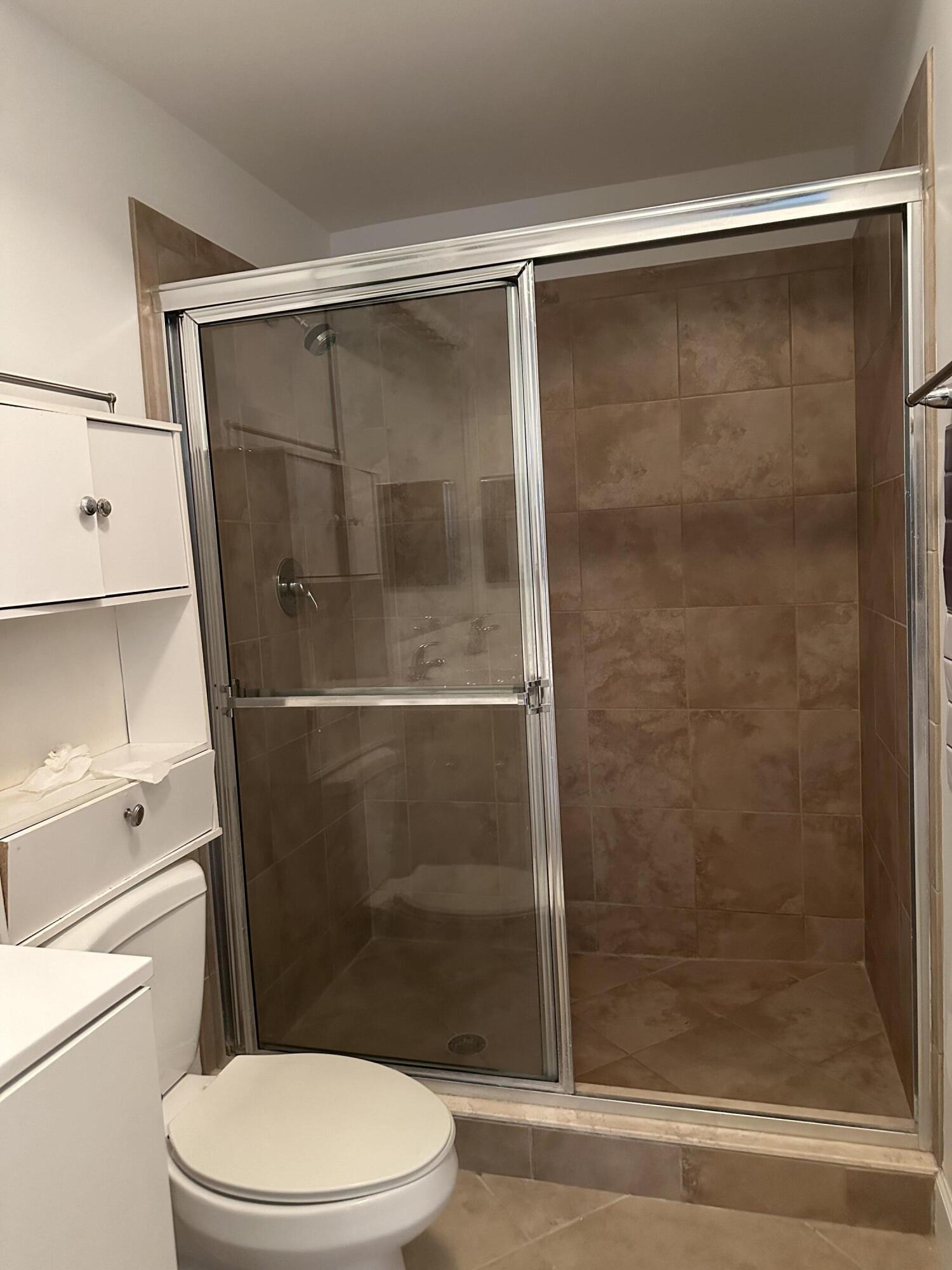 1660 Renaissance Commons Boulevard, Unit 2218 Boynton Beach, FL 33426 - Photo 16 of 47 7a master bath shower