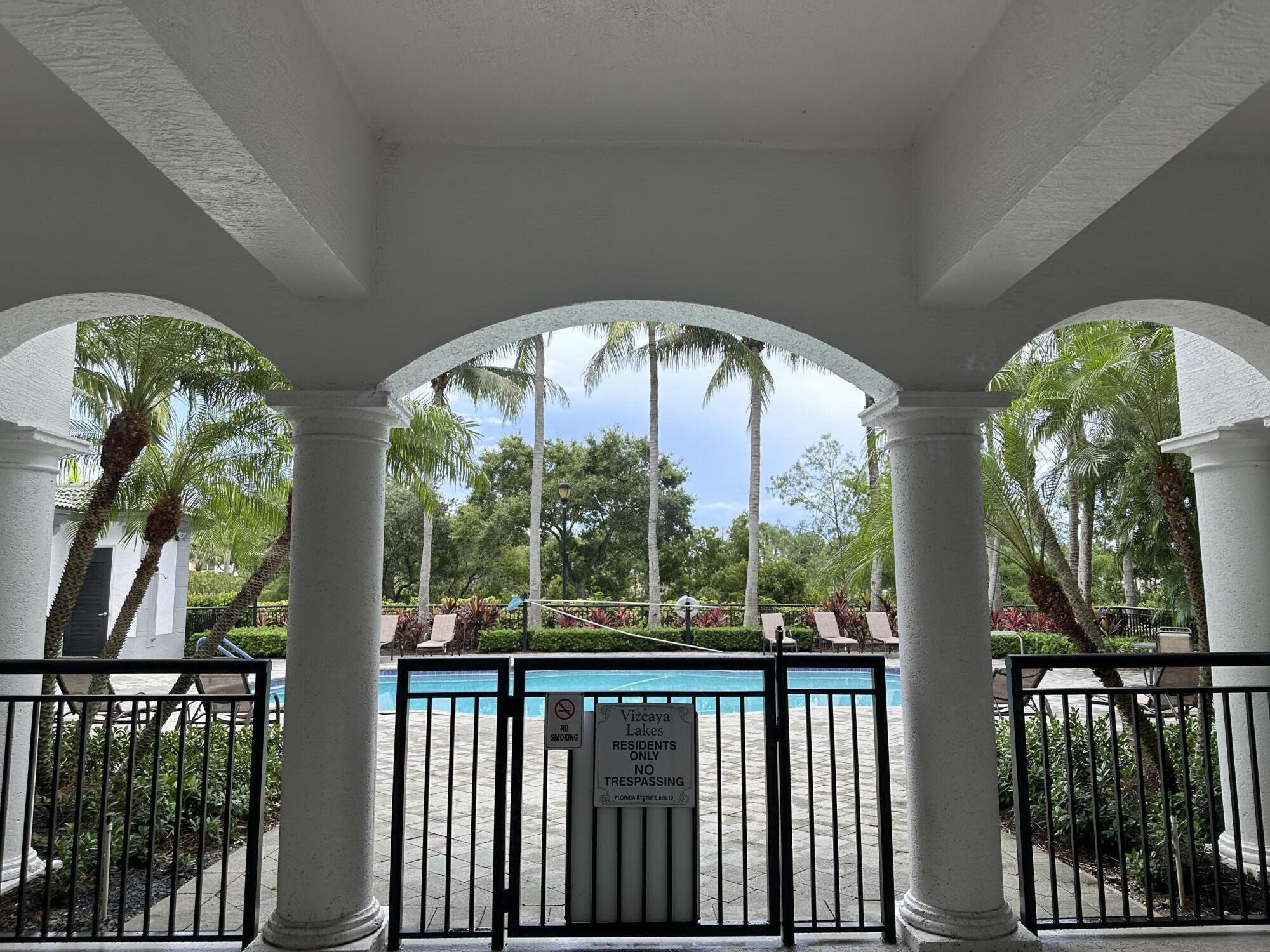 1660 Renaissance Commons Boulevard, Unit 2218 Boynton Beach, FL 33426 - Photo 35 of 47 99 clubhouse pool entrance