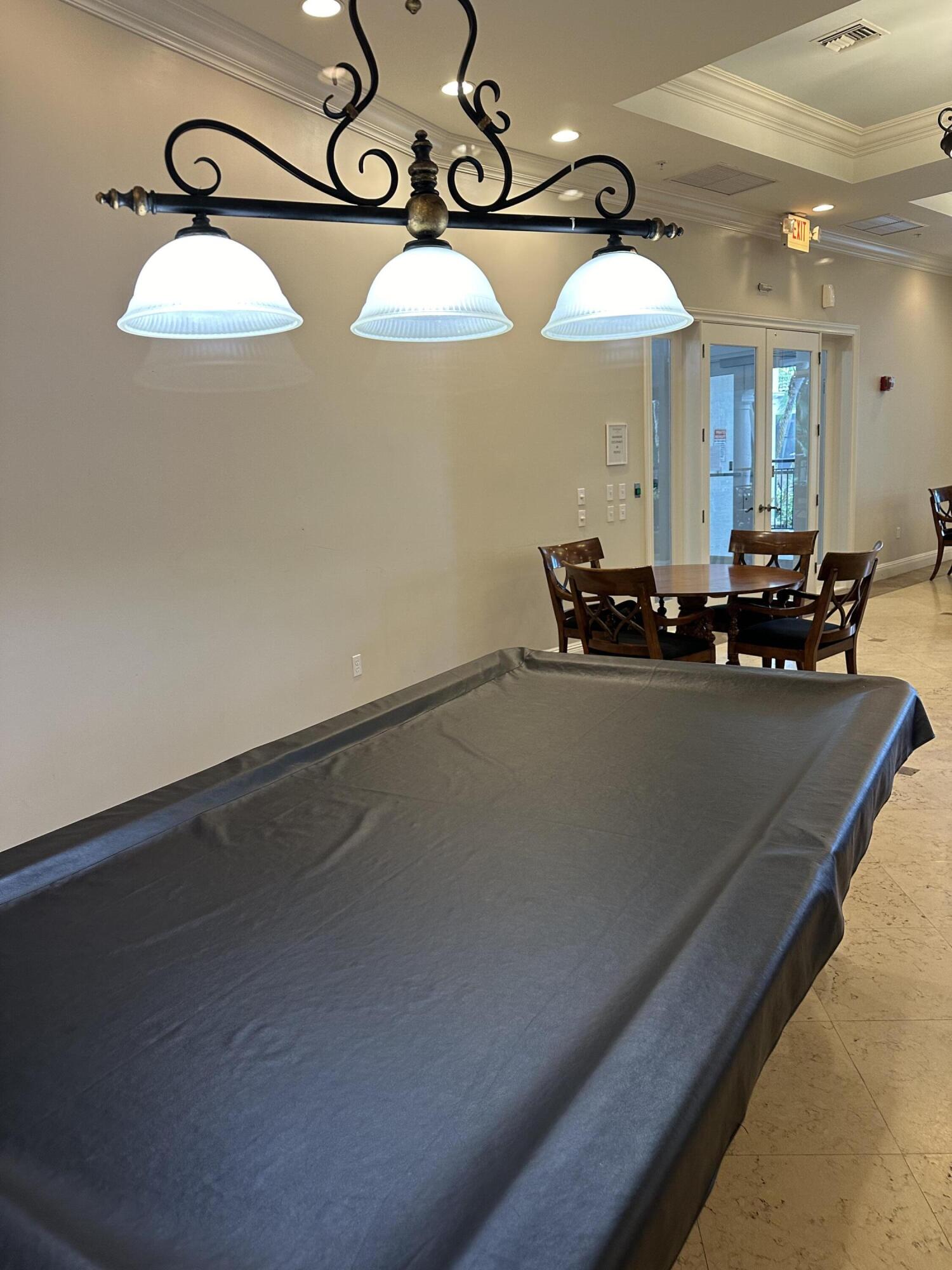 1660 Renaissance Commons Boulevard, Unit 2218 Boynton Beach, FL 33426 - Photo 36 of 47 99 Clubhouse Pool Table