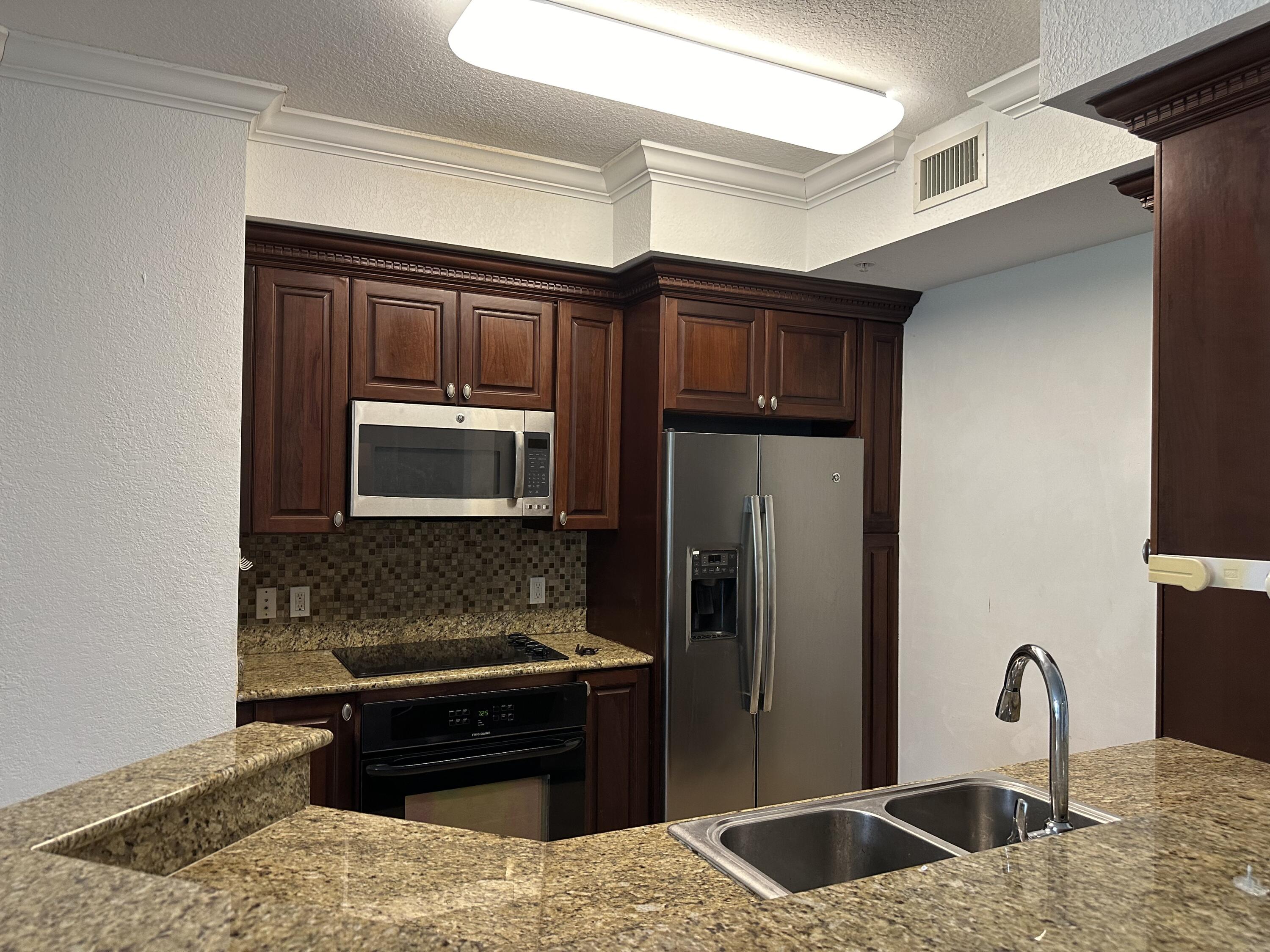 1660 Renaissance Commons Boulevard, Unit 2218 Boynton Beach, FL 33426 - Photo 10 of 47 6 kitchen (2)