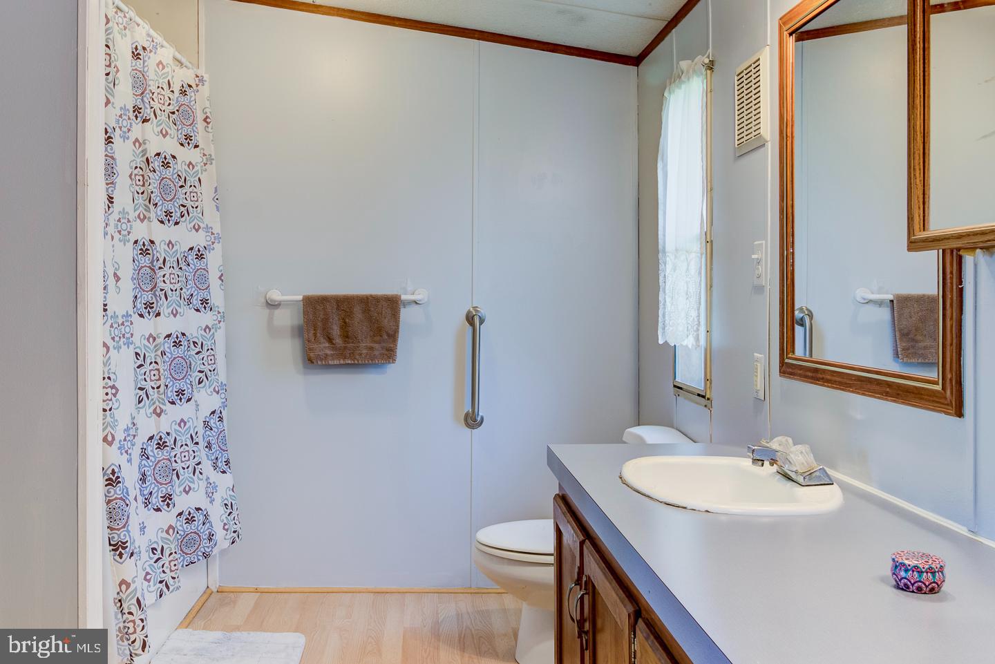 936 Newark Road Avondale, PA 19311 - Photo 15 of 38 a bathroom with a sink and a mirror