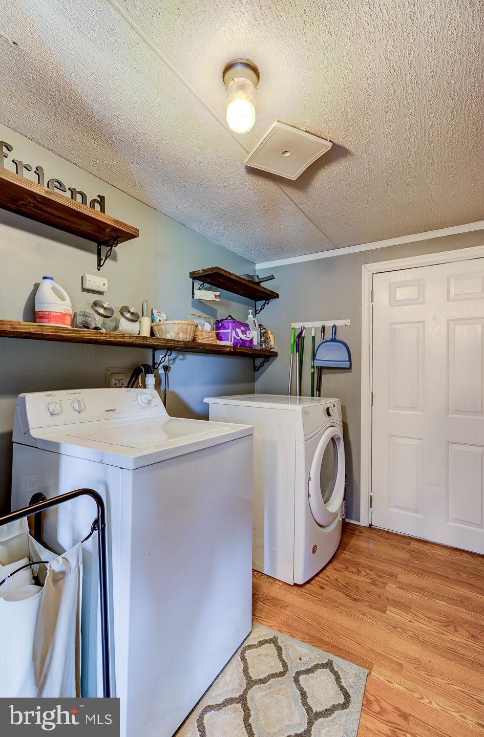 936 Newark Road Avondale, PA 19311 - Photo 21 of 38 a utility room with dryer and washer