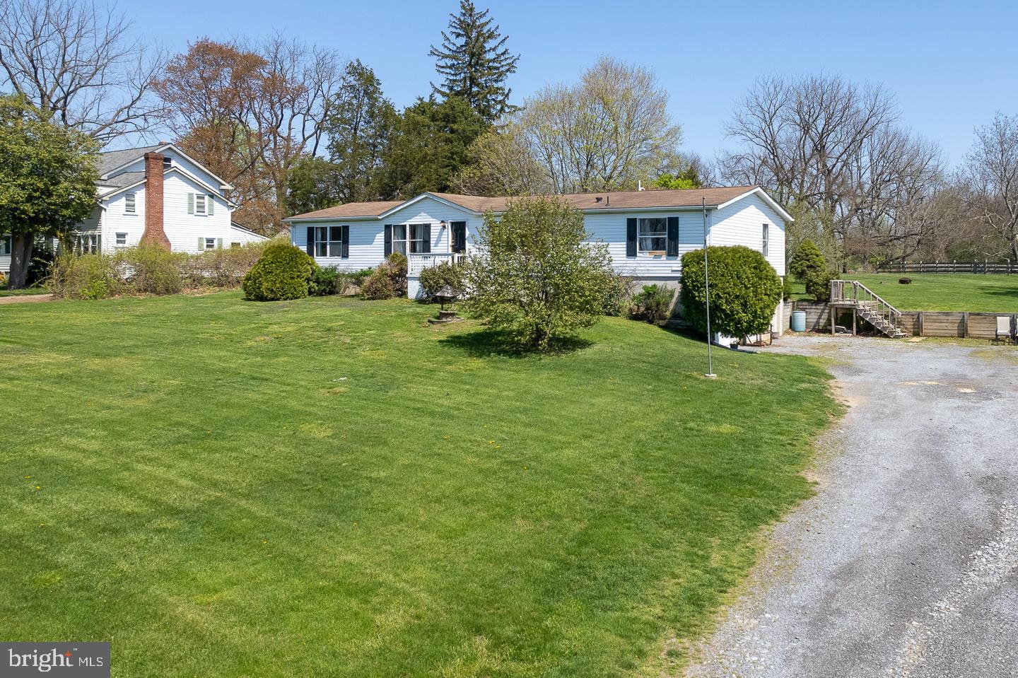 936 Newark Road Avondale, PA 19311 - Photo 23 of 38 a front view of house with yard and green space