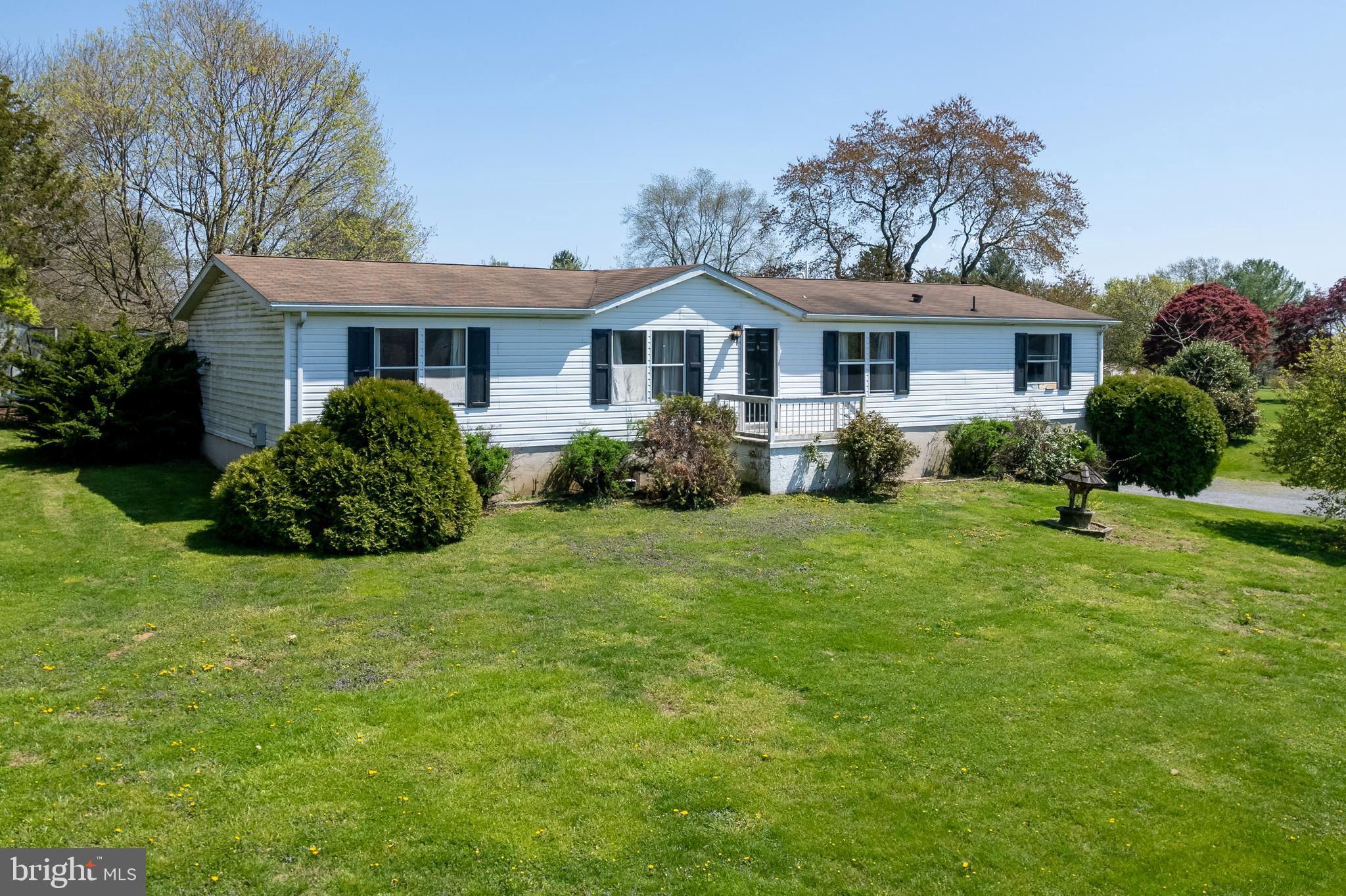 936 Newark Road Avondale, PA 19311 - Photo 27 of 38 a front view of a house with garden