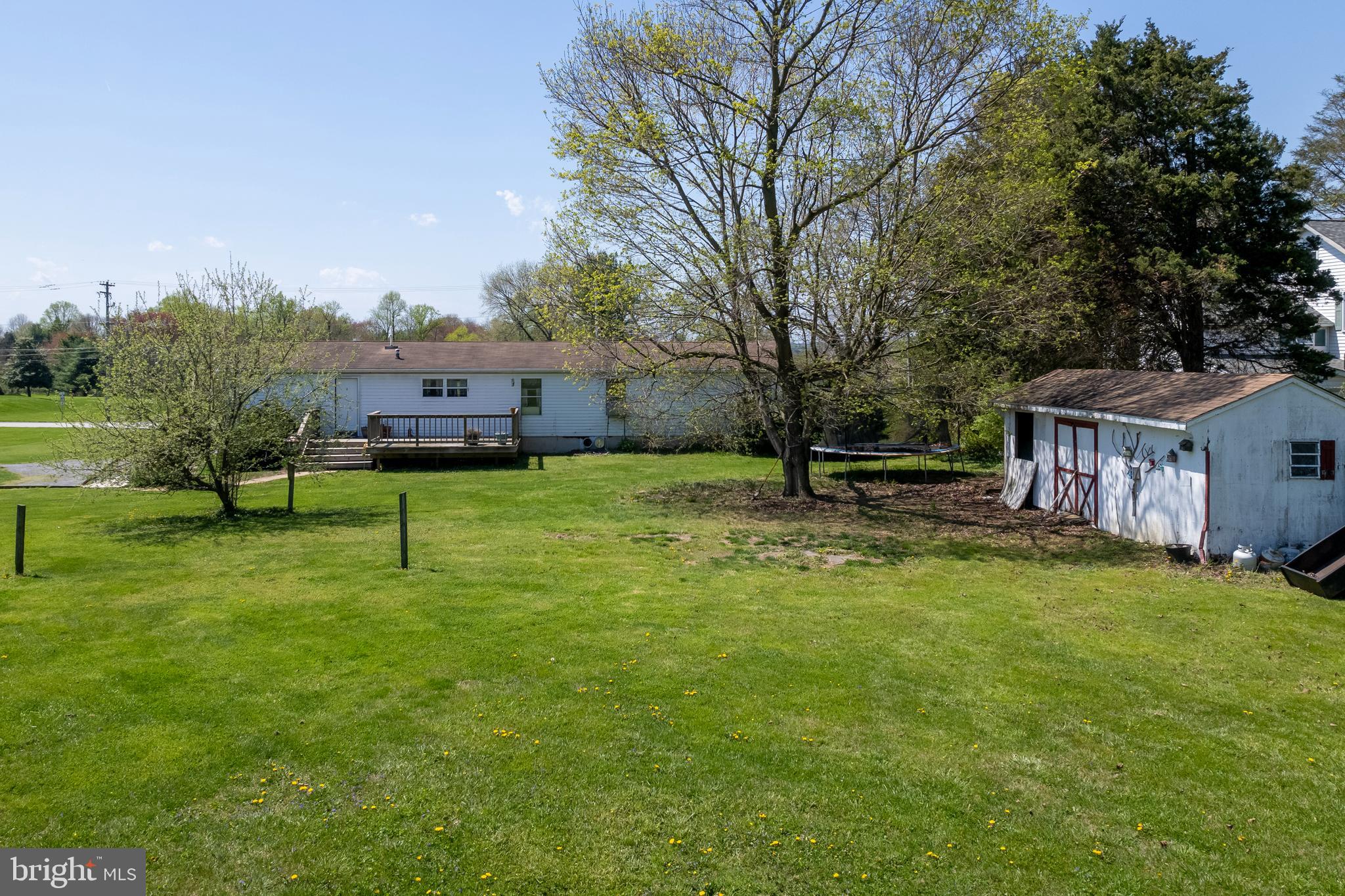936 Newark Road Avondale, PA 19311 - Photo 28 of 38 a view of a house with a yard porch and sitting area