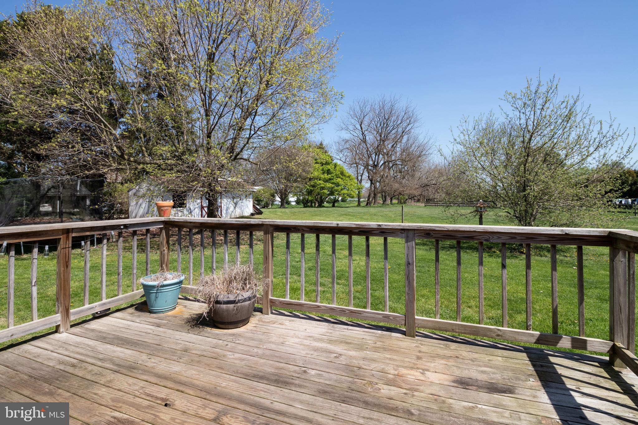 936 Newark Road Avondale, PA 19311 - Photo 29 of 38 a view of a deck with two chair and wooden floor