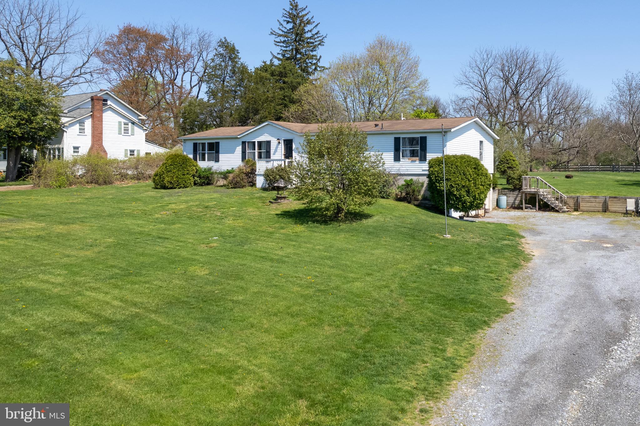 936 Newark Road Avondale, PA 19311 - Photo 31 of 38 a front view of house with yard and green space