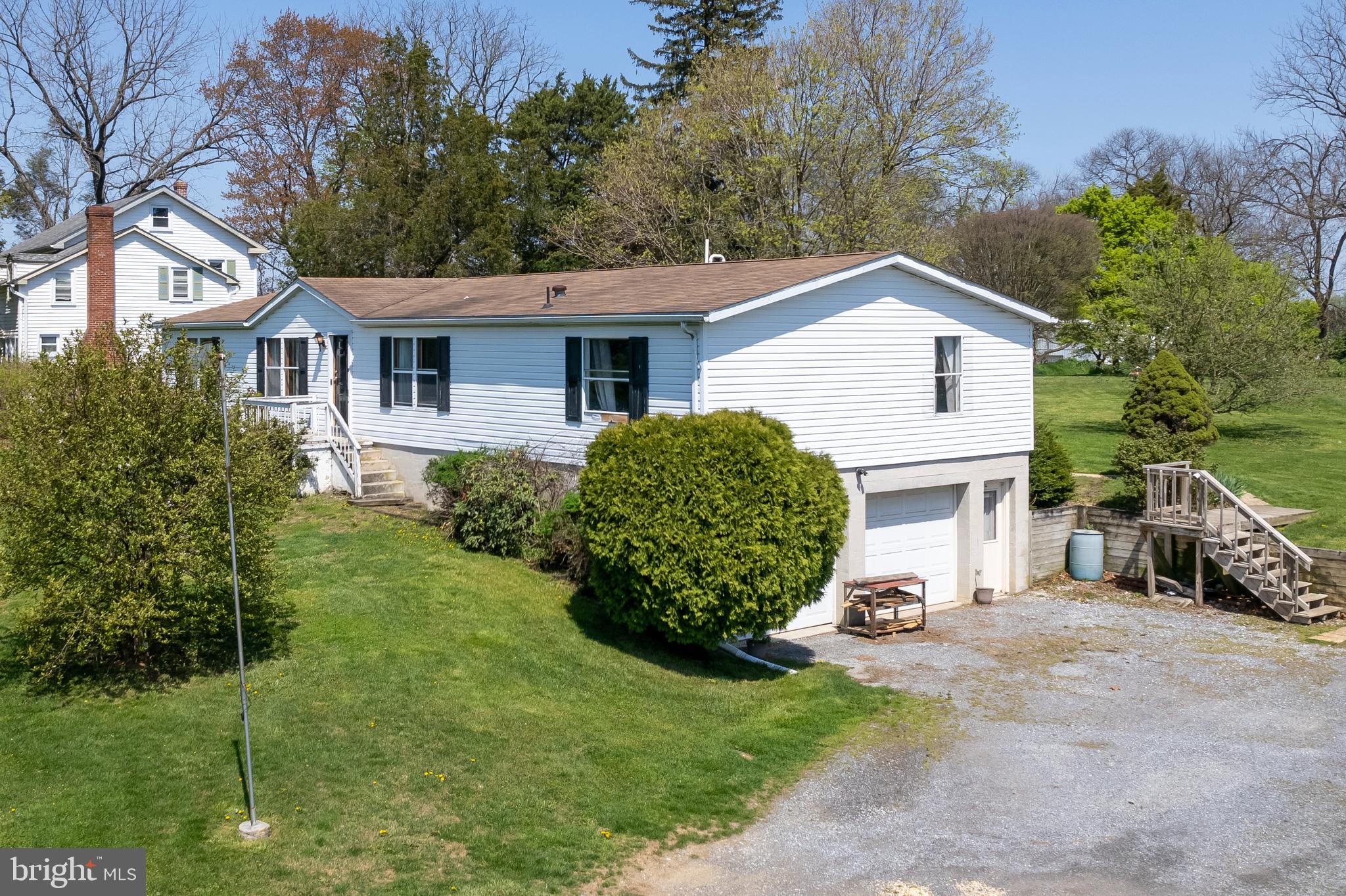 936 Newark Road Avondale, PA 19311 - Photo 32 of 38 a view of a house with a garden