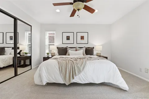 a bathroom with a sink a mirror and a shower