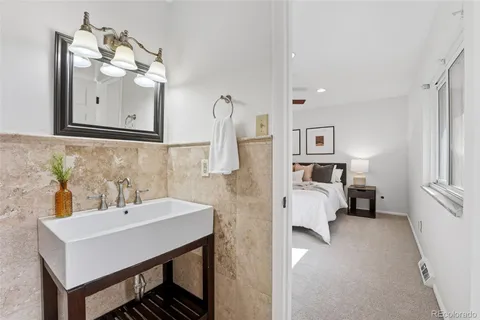 a bathroom with a sink and a shower