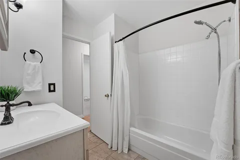 a bathroom with a toilet and a sink