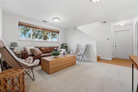a view of a backyard with wooden floor and roof with a yard
