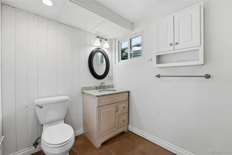 a view of a backyard with sitting area