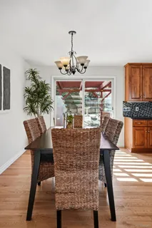 a kitchen with stainless steel appliances a sink stove and cabinets