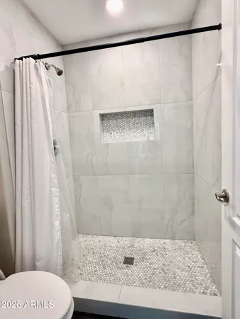 a utility room with washer and dryer