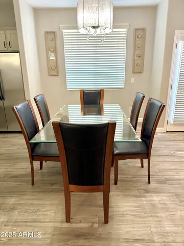 a view of a dining room with furniture