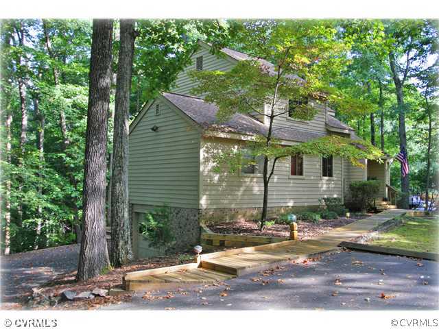 3181 East Brigstock Road Midlothian, VA 23113 - Photo 13 of 16 a view of a house with backyard
