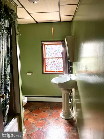 a bathroom with a sink and a toilet