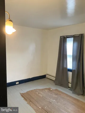 an empty room with a door