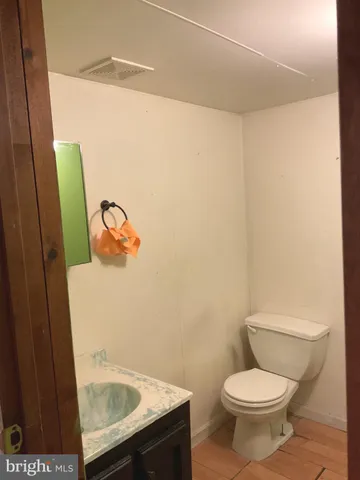 view of wooden floor and chair