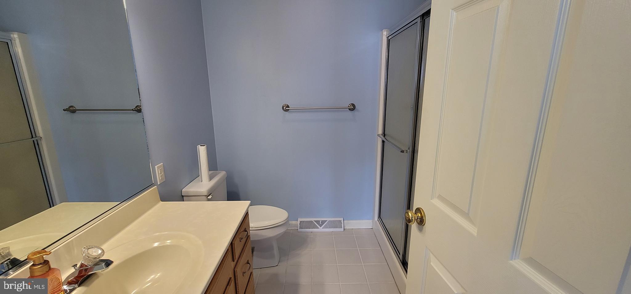 16891 Essex Road Lewes, DE 19958 - Photo 15 of 18 a bathroom with a sink and a toilet