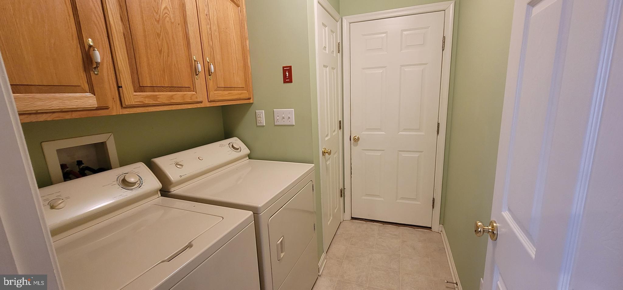 16891 Essex Road Lewes, DE 19958 - Photo 10 of 18 a utility room with dryer and washer