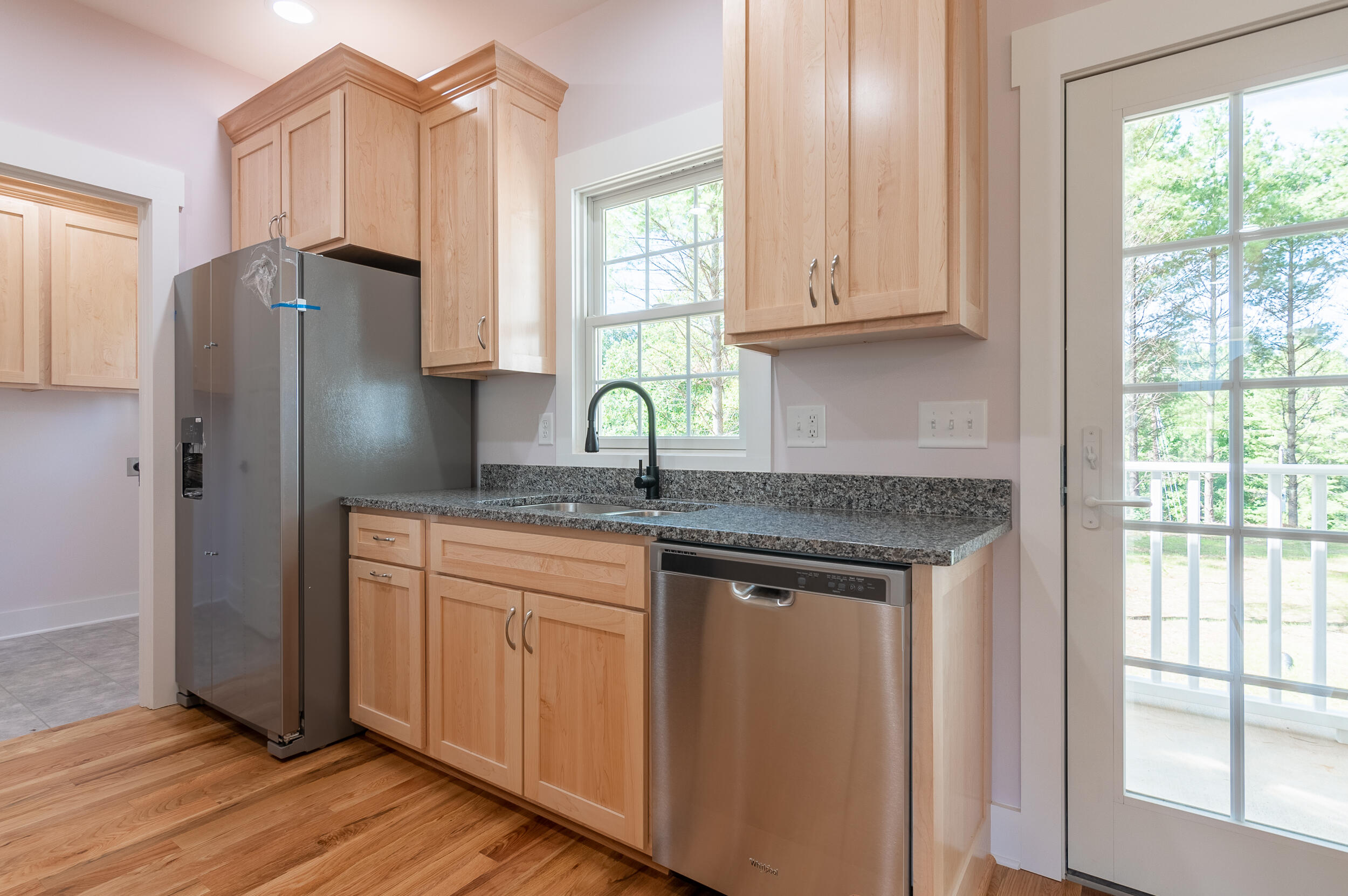 402 Parkview Road Northeast Floyd, VA 24091 - Photo 20 of 48 a kitchen with stainless steel appliances granite countertop a refrigerator sink and cabinets
