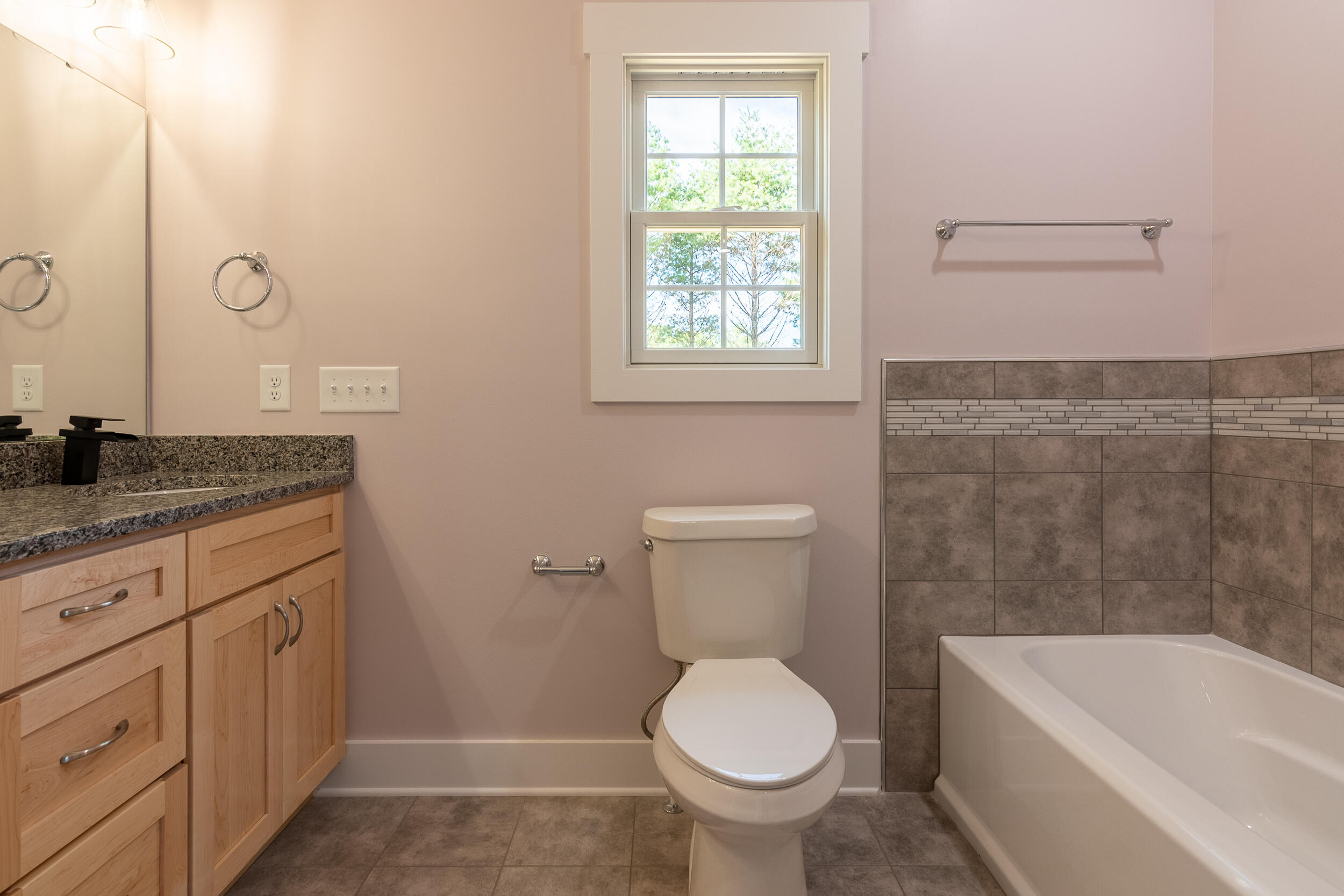 402 Parkview Road Northeast Floyd, VA 24091 - Photo 34 of 48 a bathroom with a granite countertop toilet a sink and bathtub