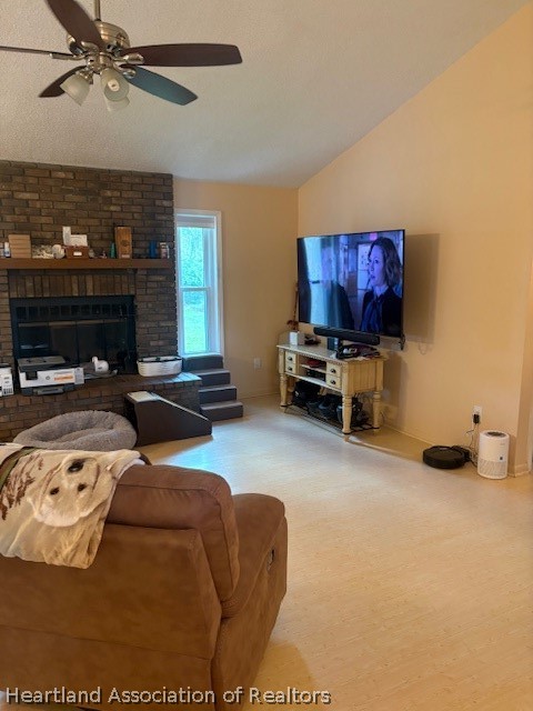5330 Lakewood Road Sebring, FL 33875 - Photo 4 of 19 a living room with furniture a flat screen tv and a fireplace