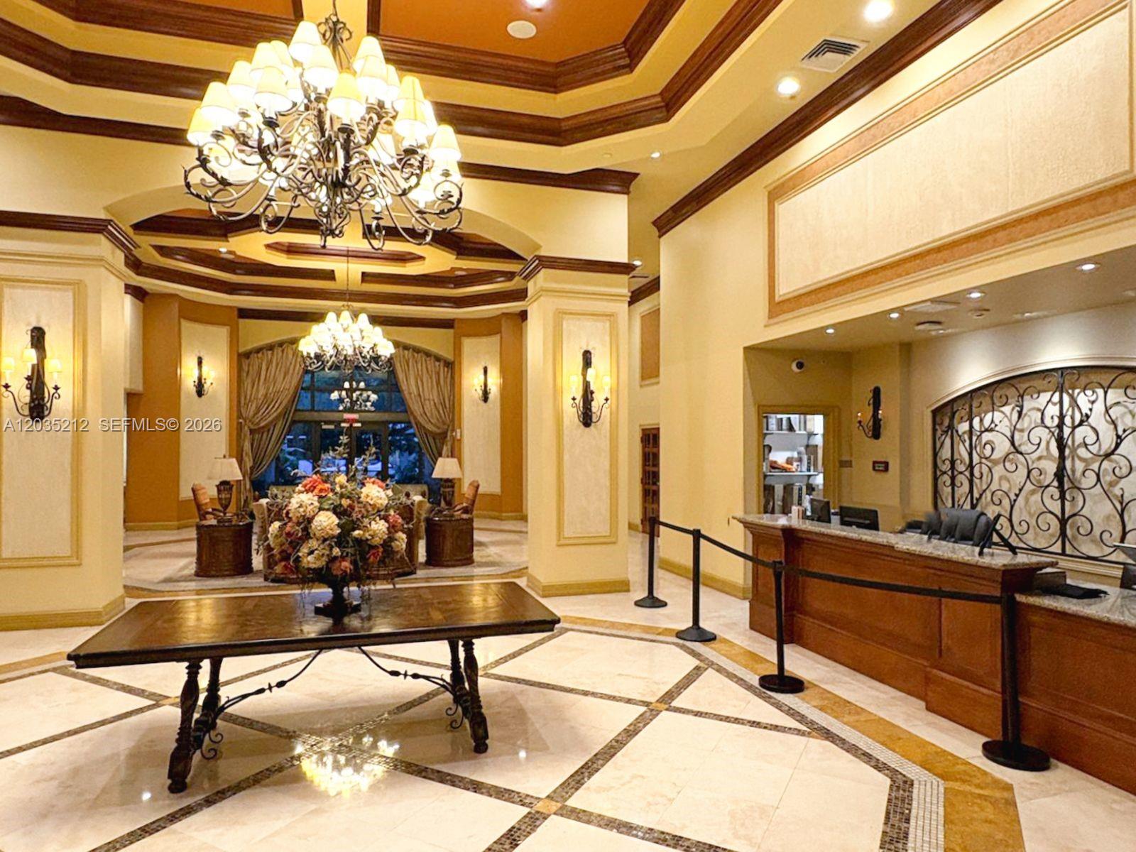 888 Douglas Road, Unit 302 Coral Gables, FL 33134 - Photo 45 of 51 LOBBY FRONT DESK