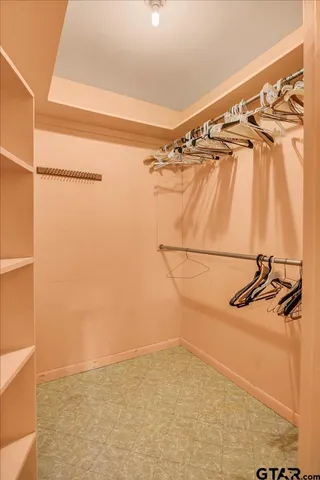 a bathroom with a shower and a tub