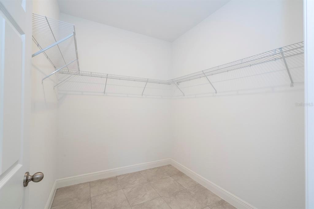 1533 West Diamond Road Citrus Springs, FL 34434 - Photo 33 of 66 a view of a room with racks on the wall